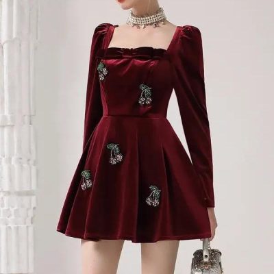 Elegant burgundy velvet dress with floral embroidery, perfect for special occasions and evening wear at Monalisa Medical Store. Stylish, luxurious, and chic for modern fashion enthusiasts.