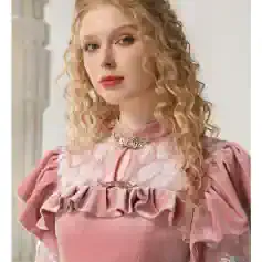 Elegant woman in pink dress with ruffles, lace, and floral embroidery, showcasing stylish fashion from Monalisa Store, perfect for special occasions or fashion-forward individuals.