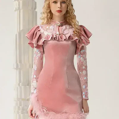 Pink satin dress with ruffled shoulders and embroidered floral sleeves for elegant events and special occasions.