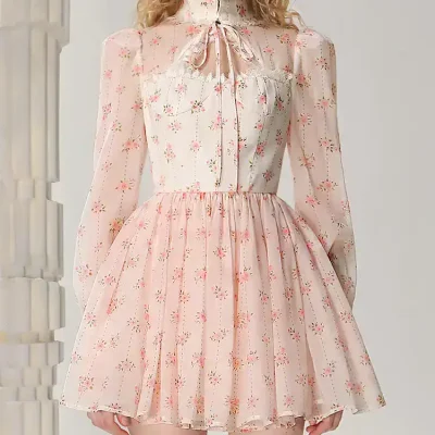 Light pink floral dress with high neckline and long sheer puff sleeves, perfect for spring and summer occasions. Elegant and feminine style from Monalisa Store, ideal for casual or semi-formal wear.