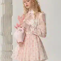 Pink floral dress with long sleeves and high collar, elegant and feminine fashion for women, suitable for special occasions or casual wear.