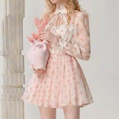Pink floral dress with ruffled collar and long sleeves, elegant fashion look for women, stylish dress from Monalisa Store, perfect for spring or summer occasions.