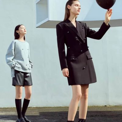 Black balloon with fashionable women at Monalisa Store showcasing modern eyewear and accessories, emphasizing stylish optometry products and trendy eyewear collections.