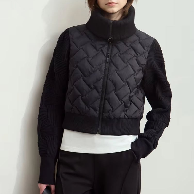 Stylish black quilted and knit bomber jacket for women, perfect for cold weather and casual fashion, featuring a high collar, zip closure, and comfortable fit.