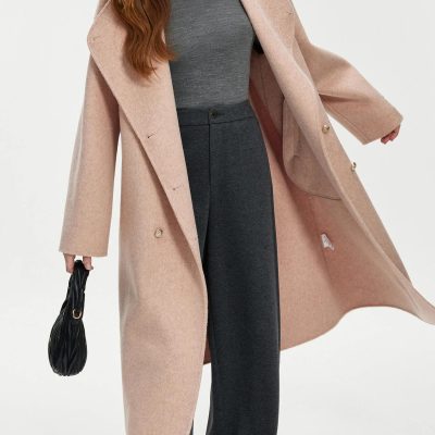 Luxurious pink wool coat styled with a gray top and dark trousers, perfect for cold weather. Elegant and fashionable outerwear from Monalisa Medical Store, ideal for professional or casual wear.