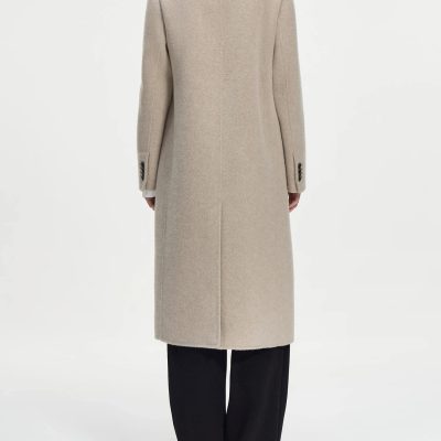 Luxurious beige overcoat for women, perfect for stylish winter fashion and cold weather protection.