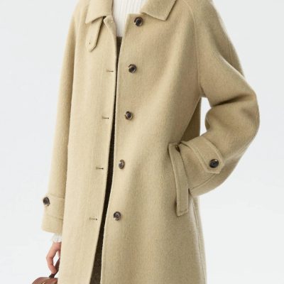 Light beige wool coat from Monalisa Store, perfect for stylish winter wear with oversized design and classic button details. Elevate your fashion with this cozy, elegant outerwear.