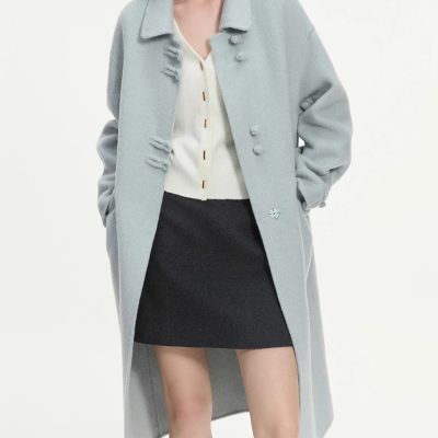 Luxurious women's wool coat in soft light gray, stylish and warm perfect for fall and winter fashion, available at Monalisa Store for premium winter wear.
