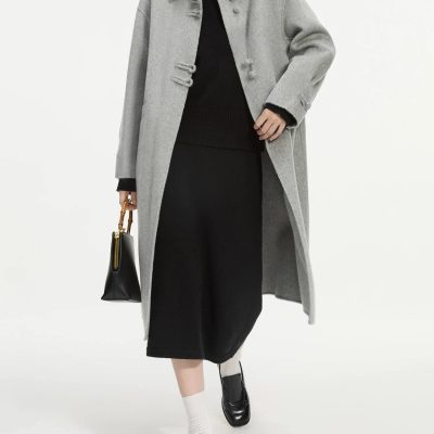 Luxury women's fashion coat from Monalisa Store, featuring a stylish grey wool overcoat, perfect for sophisticated winter wear and layering for the cold season.