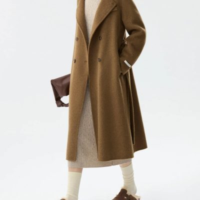Luxurious brown wool coat with double-breasted buttons, perfect for winter fashion. Stylish outerwear piece showcased in a minimalist studio setting for Monalisa Medical store.