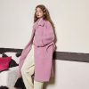 Pink fluffy coat for women, stylish winter outerwear from Monalisa Store, cozy and fashionable outerwear, perfect for cold weather, modern and elegant fashion statement for women.
