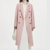 Stylish pink double-breasted wool coat for women, perfect for cold weather and fashion-forward winter outfits. Elegant and cozy outerwear from Monalisa Store.