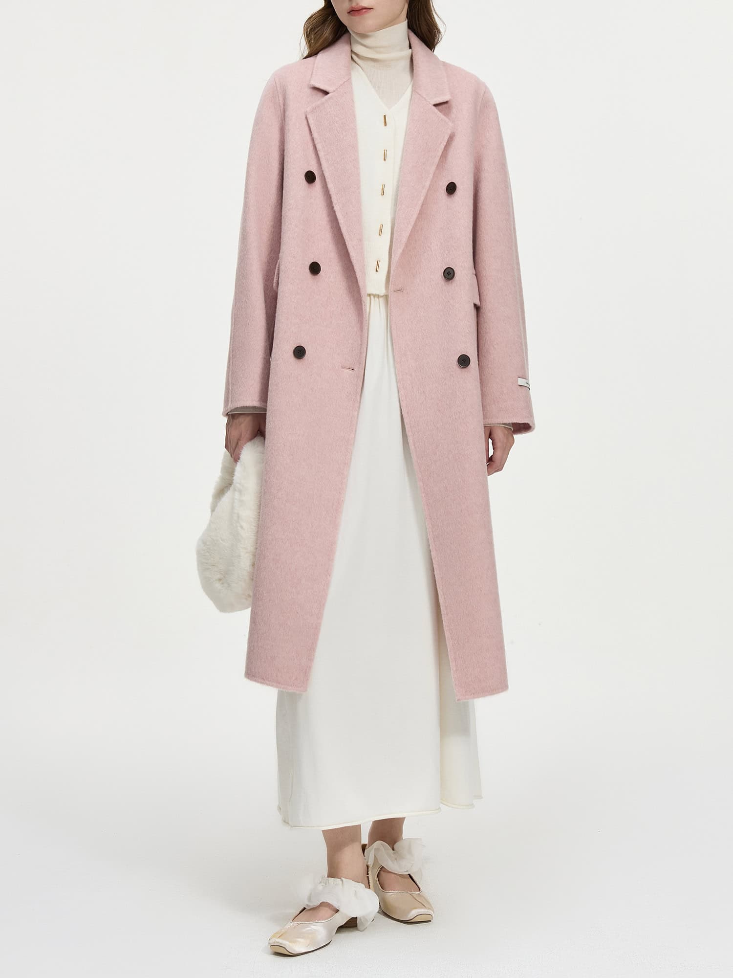 Luxurious pink wool double-breasted coat with a classic lapel, styled for elegant winter fashion from Monalisa Store.