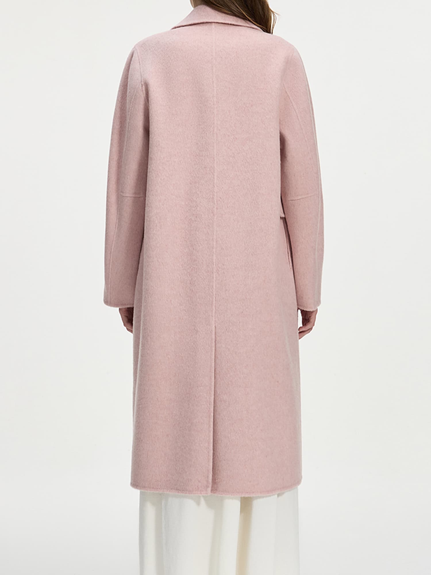 Soft pink wool blend coat with long sleeves, tailored fit, and knee-length design, perfect for stylish and warm winter or fall outfits.
