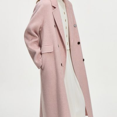 Luxurious pink wool coat with tailored lapels and button details, perfect for winter fashion or casual chic. Ideal for trendy, elegant, and warm outerwear choices.