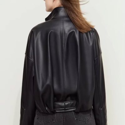 Black faux leather bomber jacket for women, stylish and trendy outerwear, perfect for casual and streetwear fashion. Comes with zippered cuffs and a sleek, modern design.