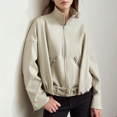 A beige oversized zip-up jacket with a high collar and waist belt, showcasing stylish casual wear options from Monalisa Store.