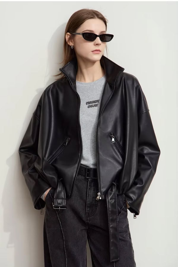 Black leather jacket fashion model, stylish sunglasses, casual streetwear look, modern apparel, Monalisa Store opt clothing.