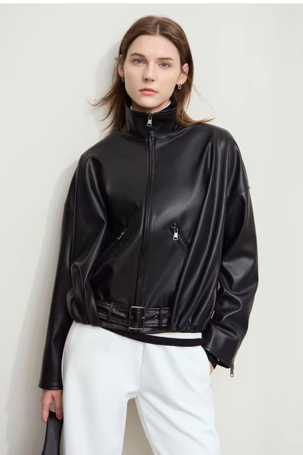 Black faux leather oversized zip-up jacket for women with stylish design and adjustable belt, perfect for fall and winter fashion.