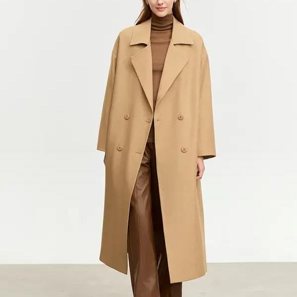 Luxurious beige double-breasted women's coat featured on Monalisa Store for stylish winter fashion and outerwear.
