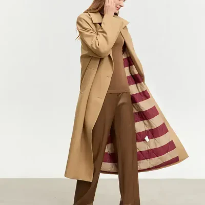 Luxurious beige trench coat with a signature striped lining, perfect for stylish winter or fall outfits from Monalisa Store. Elegant and versatile outerwear for women.