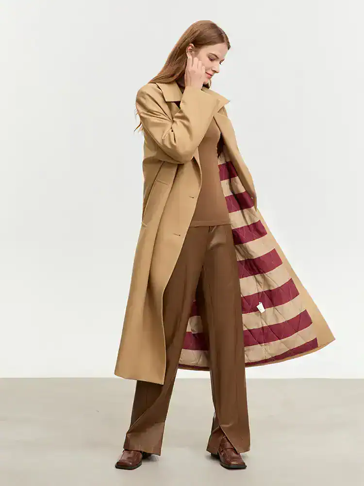 Luxurious beige trench coat with a signature striped lining, perfect for stylish winter or fall outfits from Monalisa Store. Elegant and versatile outerwear for women.