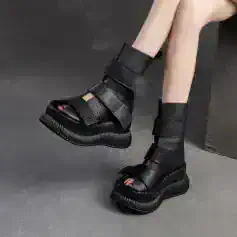 Black leather platform sandals with wide straps and chunky sole, fashion-forward footwear for women, trendy and stylish summer shoes from Monalisa Store.