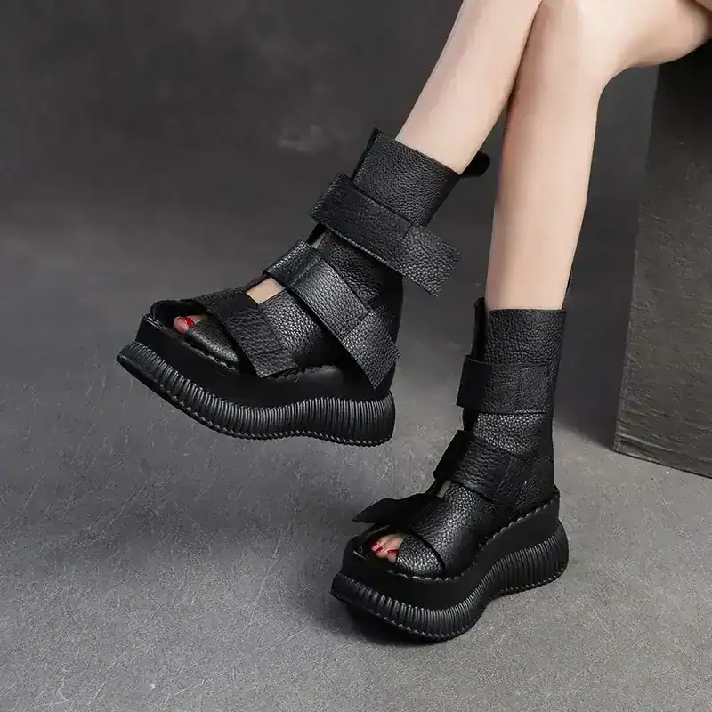 Black leather platform sandals with wide straps and chunky sole, fashion-forward footwear for women, trendy and stylish summer shoes from Monalisa Store.