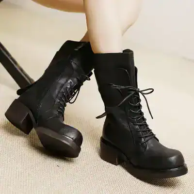 Black lace-up ankle boots with chunky heels, stylish and versatile footwear for women. Perfect for casual or edgy fashion statements, available at Monalisa Store.