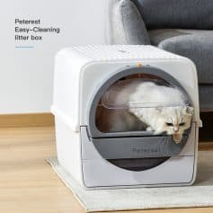 White pet litter box with transparent door and cat inside, modern design for comfortable pet hygiene, easy-clean, suitable for cats at Monalisa Store.