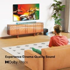 Vibrant living room with a modern TV setup, Dolby Atmos sound system, and cozy seating to enjoy cinema-quality audio-visual entertainment at home.