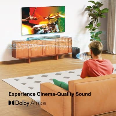Vibrant living room with a modern TV setup, Dolby Atmos sound system, and cozy seating to enjoy cinema-quality audio-visual entertainment at home.