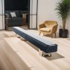 Wireless soundbar placed in modern living room for premium audio experience.