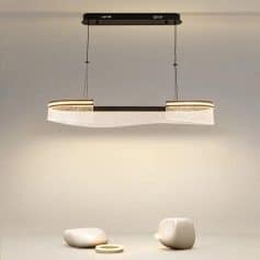 Contemporary LED pendant light fixture hanging from ceiling with minimalist design, ideal for modern interior decor.