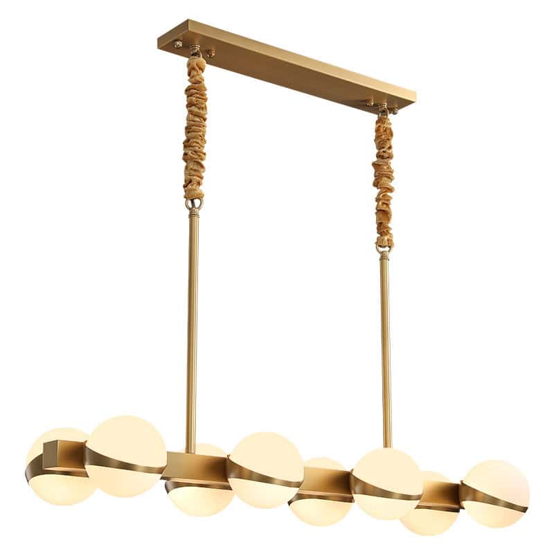 Modern gold chandelier with spherical glass lights for elegant bedroom or living room decor.