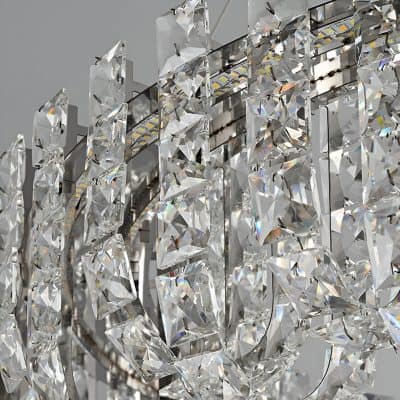 Luxurious crystal chandelier with intricate design, perfect for upscale optometry and eyewear stores. Enhances store aesthetics and highlights high-end eyewear collections.