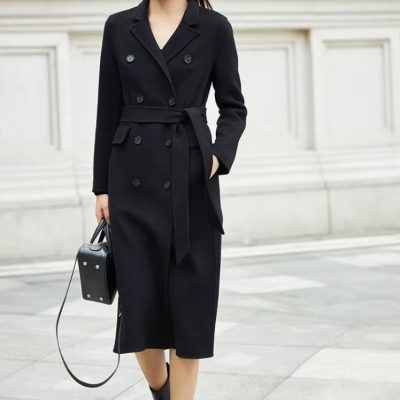 Stylish black trench coat for women, perfect for fall and winter fashion, from Monalisa Store. Elegant outerwear with a waist belt, ideal for professional and casual wear.