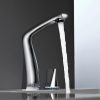 Futuristic stainless steel faucet with an elegant design, dispensing water into a sink, showcasing modern bathroom or kitchen fixtures.