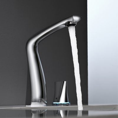 Chrome faucet with water flowing over a modern bathroom sink, representing contemporary bathroom fixtures and high-quality plumbing options at Monalisa Store.