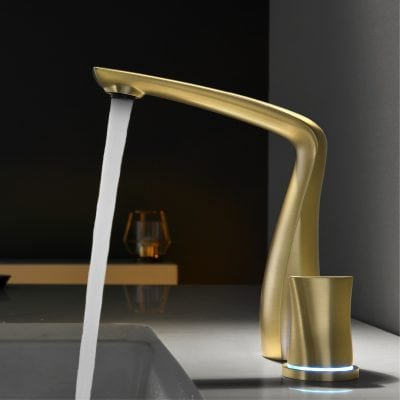 Sleek gold modern bathroom faucet with flowing water, stylish and contemporary bathroom fixture suitable for upscale homes and hotel interiors, high-quality design and elegant finish.