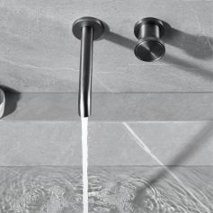 Sleek modern bathroom faucet with water flowing, stainless steel finish, minimalist design for contemporary bathroom decor.