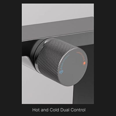 Temperature control knob for luxury heating and cooling system. Elegant metallic design with dual hot and cold settings. Perfect for modern bathroom or living space.
