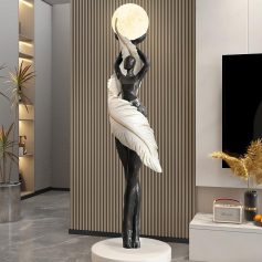 Elegant statue of a woman holding the moon with artistic feather details, perfect for modern interior decor and enhancing aesthetic appeal in luxury spaces.