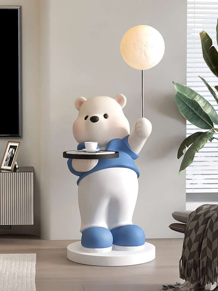 Cute bear statue holding a floating tray and a moon lamp in a modern living room, perfect for a cozy and stylish home decor. Ideal for enhancing interior design with playful and whimsical accents.