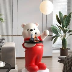 Cute bear-shaped figure holding a tray of laboratory glassware, modern interior with greenery, stylish lamp, and comfortable furniture, emphasizing a playful yet sophisticated ambiance at Monalisa Store.