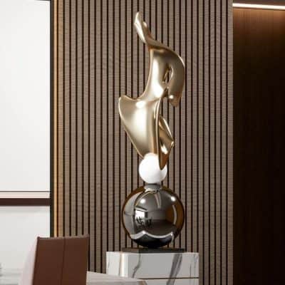 Modern abstract sculpture at Monalisa Store featuring elegant metallic design and contemporary art decor for opt clinics and medical interiors.