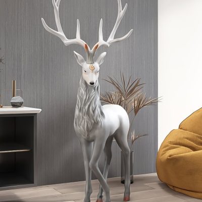Elegant white decorative reindeer sculpture with large antlers, ideal for home decor and holiday themed interiors, available at Monalisa Store.