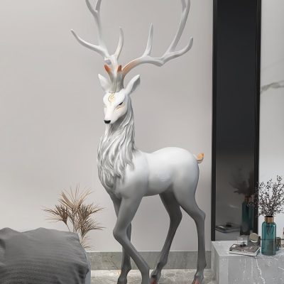Elegant white decorative reindeer sculpture with antlers, ideal for home decor or holiday displays, showcased at Monalisa Store for modern interior styling.