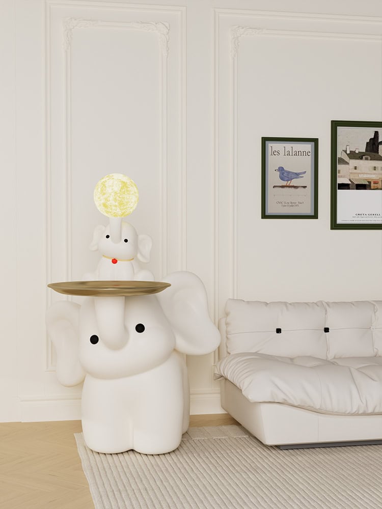 Cute elephant-themed lamp with whimsical dog figurine on top, enhancing modern interior decor for a cozy, stylish space.