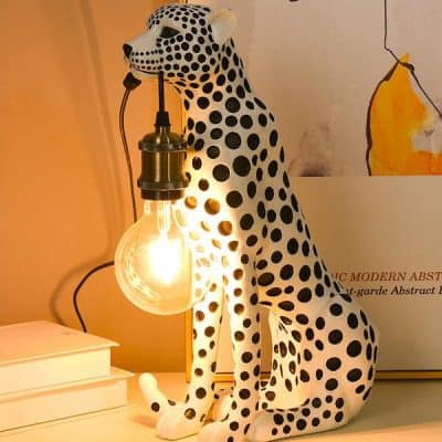 Stylish cheetah-shaped lamp with an Edison bulb, perfect for modern home decor and lighting solutions at Monalisa Store.